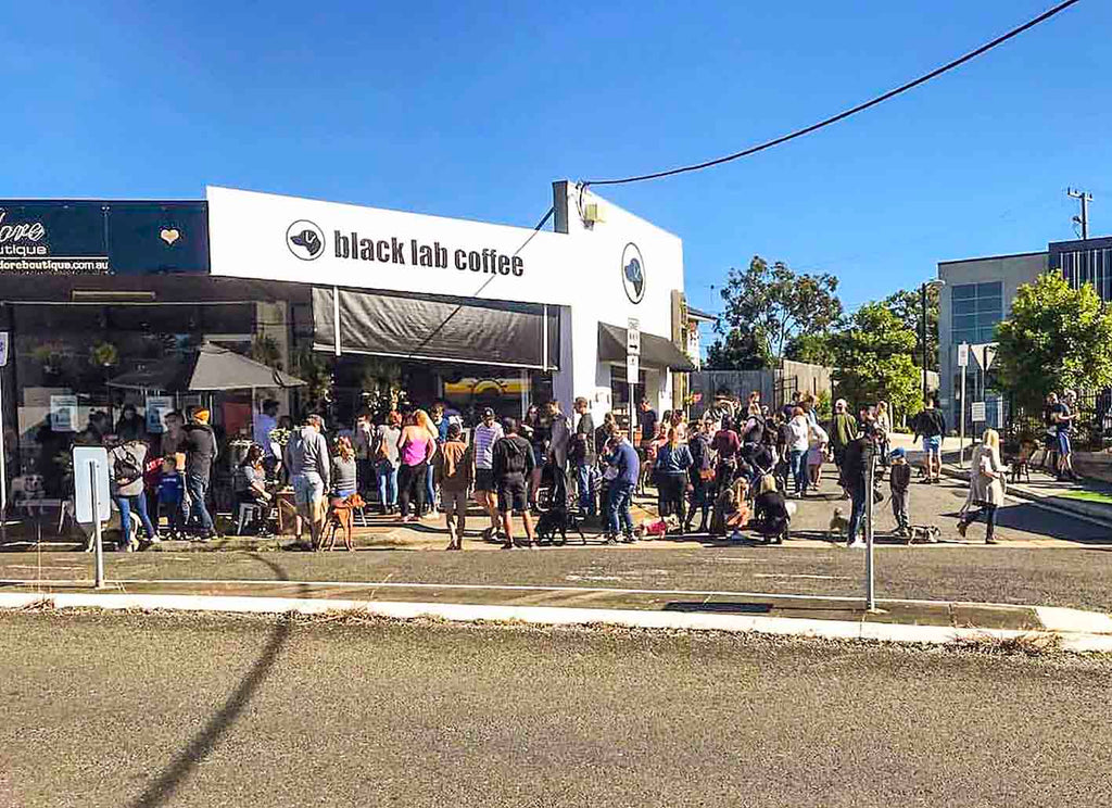 people outside black lab coffee